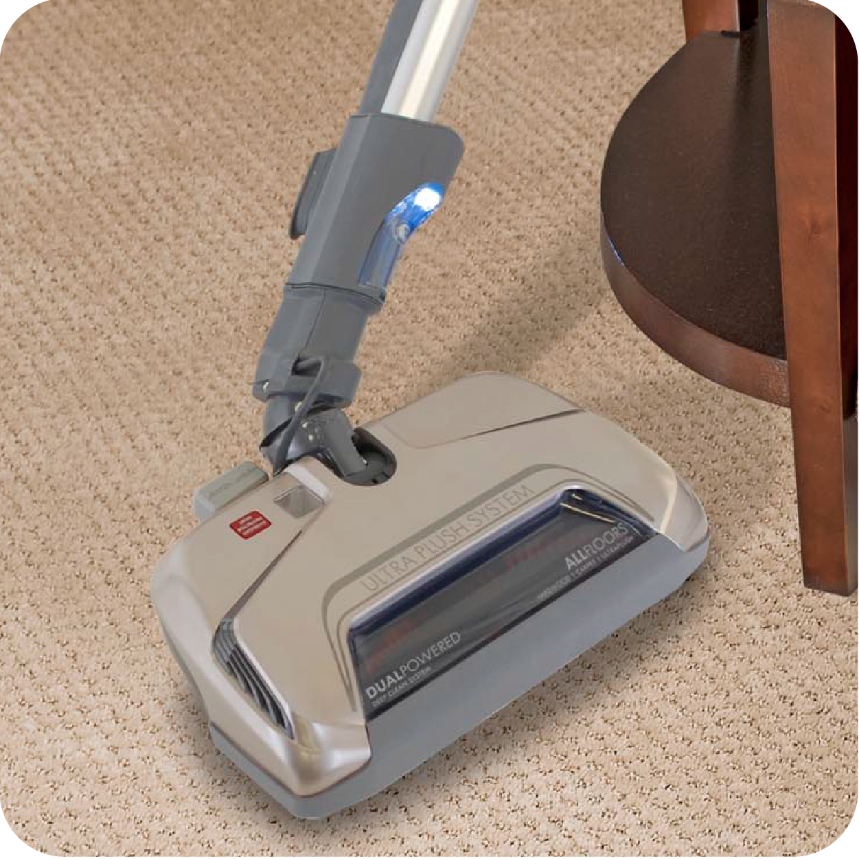 Close up of swivel feature. Nozzle is shown swiveling around a table.