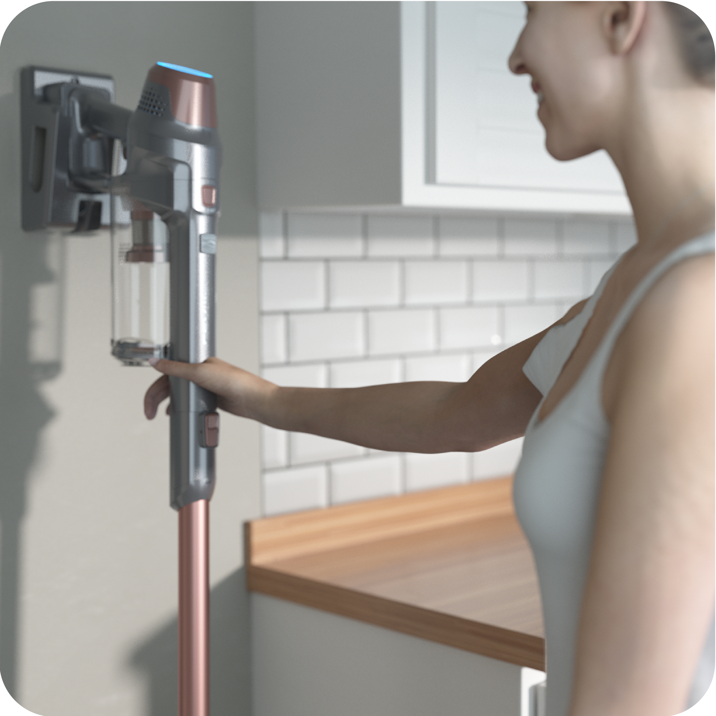 Person returning a cordless stick vacuum to its wall mountable charging dock