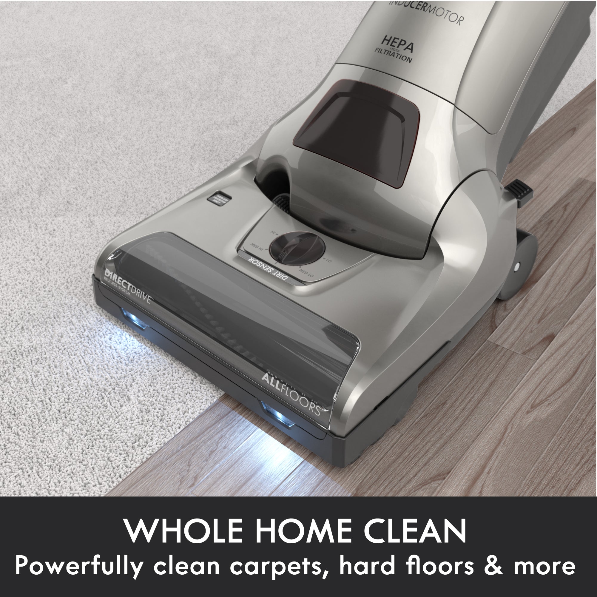 Vacuum cleaner on carpet and hard floor with text 'Whole Home Clean' and 'Powerfully clean carpets, hard floors & more'.