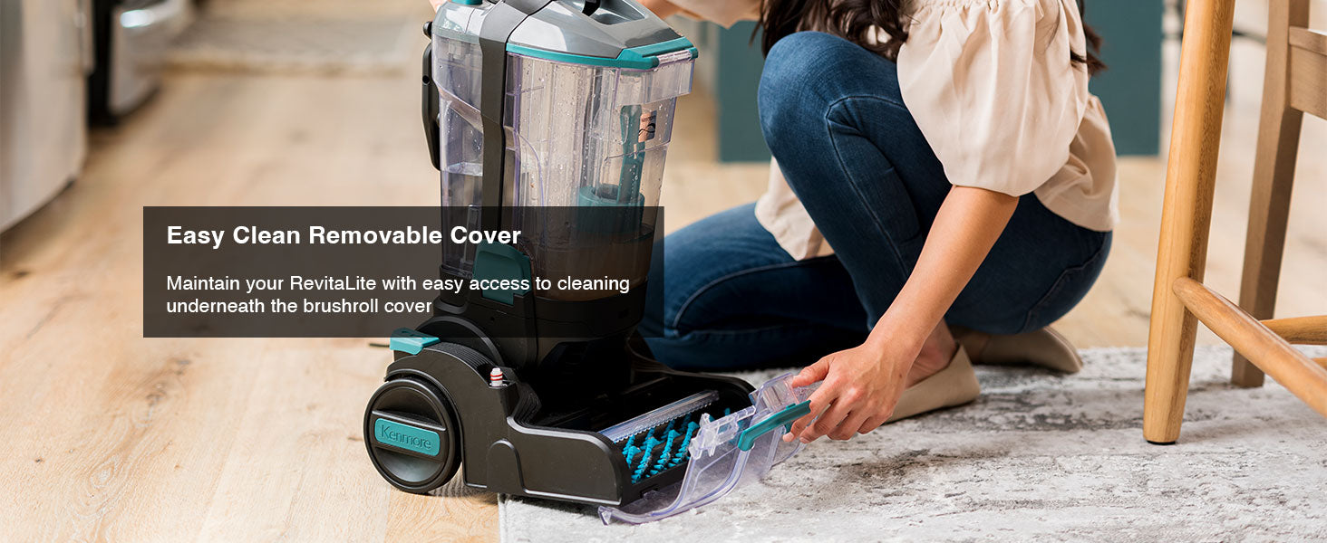 Person using a RevitaLite carpet cleaner with an easy-clean removable cover on a wooden floor.