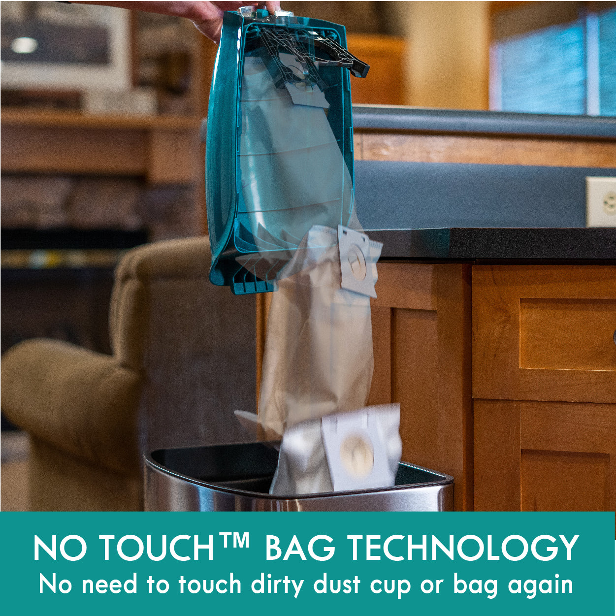 Person using no-touch bag technology to dispose of trash in a kitchen setting.