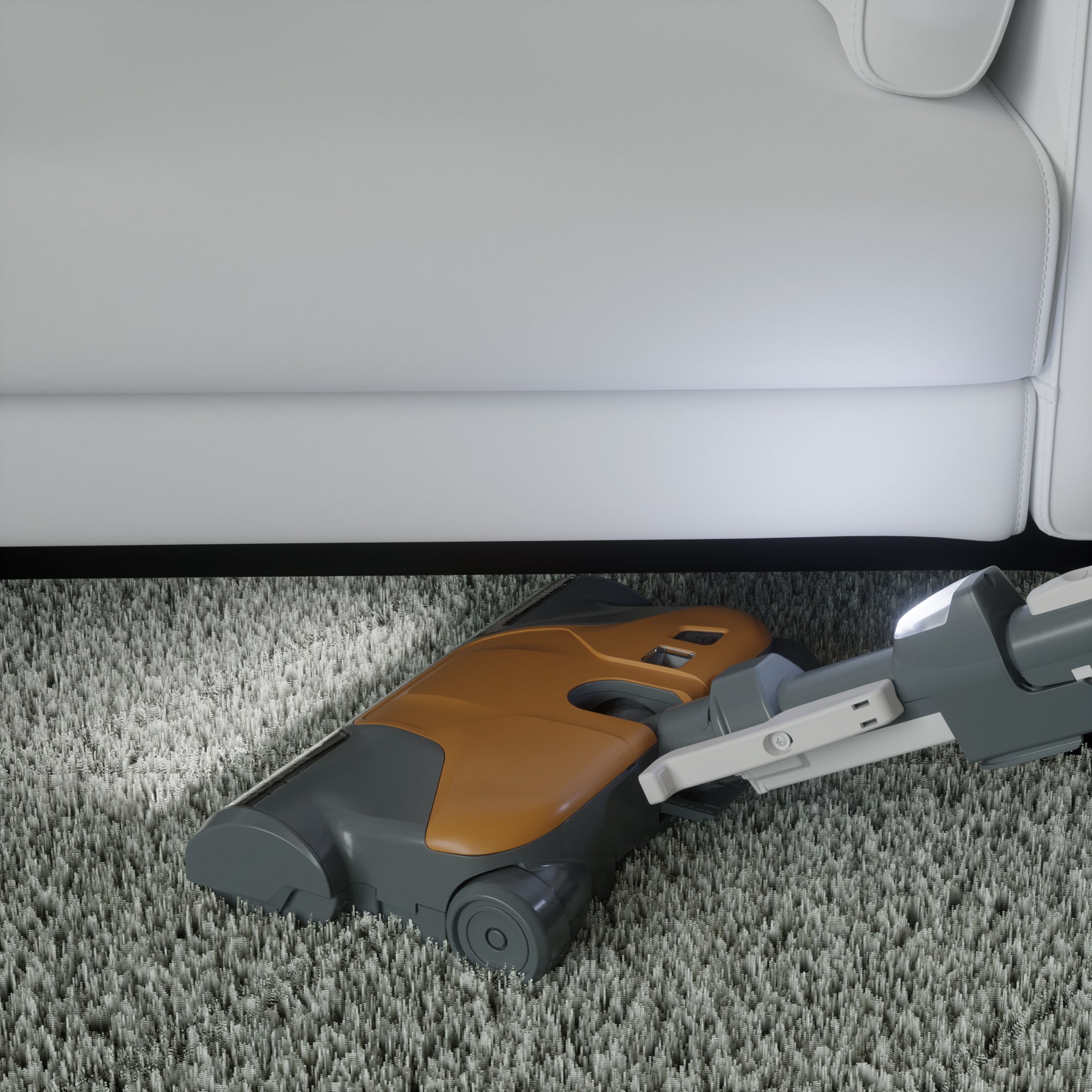 Canister vacuum cleaning underneath a couch with an LED headlight turned on, cleaning a carpeted floor