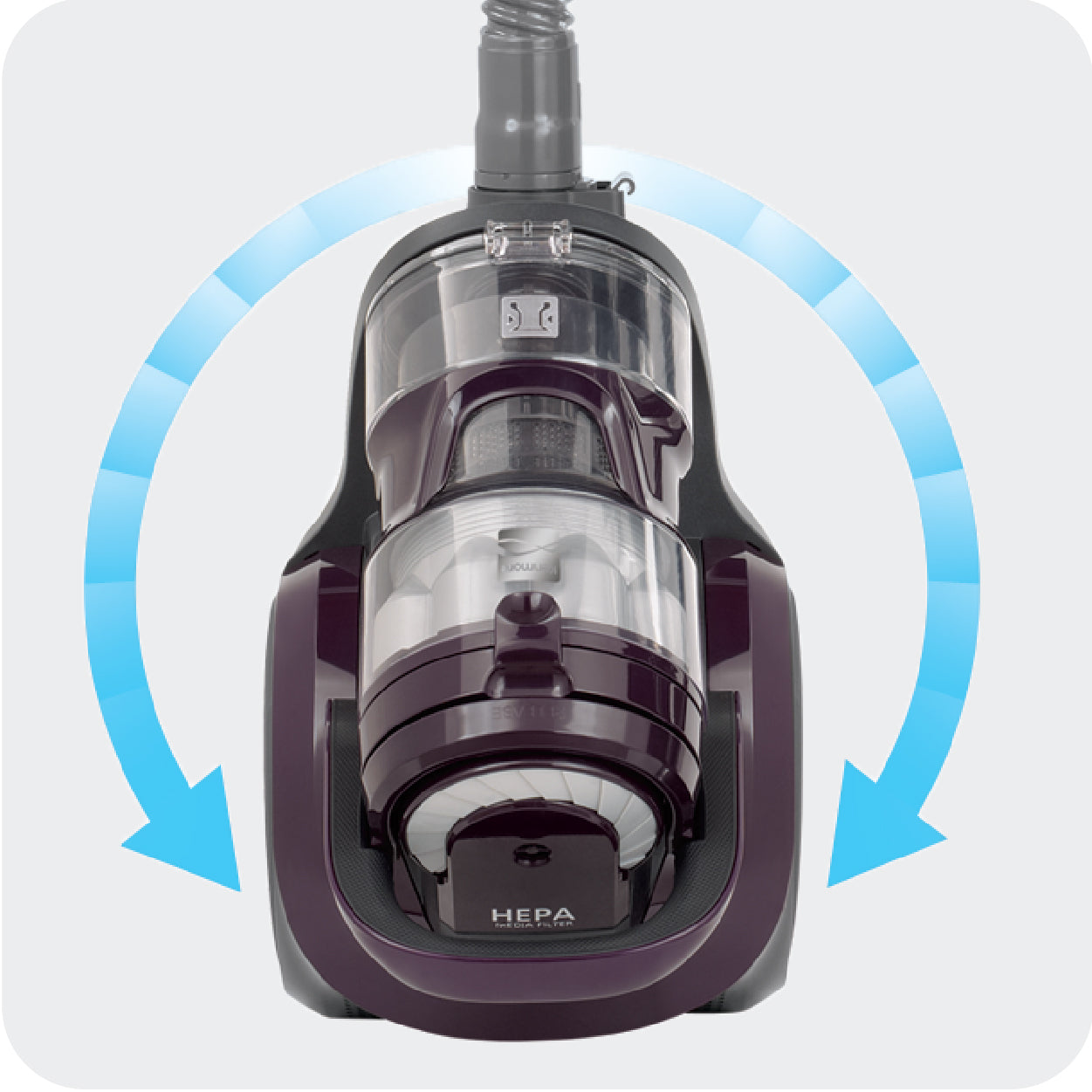 Purple bagless canister vacuum cleaner with blue arrows indicating swivel maneuverability on a light gray background