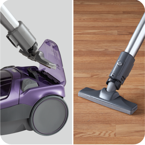 Purple and gray canister vacuum cleaner using the POP-N-GO feature on a wooden floor.