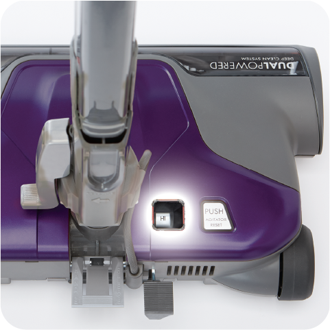 Purple and gray canister vacuum cleaner nozzle on a white background